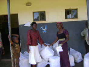 Health Worker Giving out a mosquito net