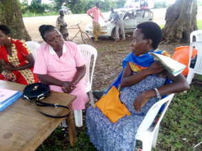 A pregnant woman asking for a LLIN at the outreach