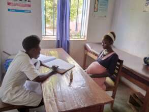 PREGGANT MOTHER AI THE ANTENANTAL ROOM