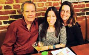 Vivian with her now-parents, Thomas and Susan