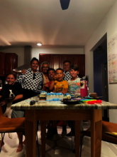 Jhon and Taylor celebrate a birthday with family
