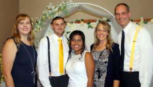 Yamile and her family on her wedding day