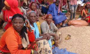 Community women at grain distribution