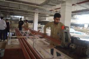 Sami at the construction site in Karachi