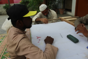 Furqan trying his hand at embroidery