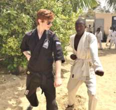 Robbie orients a new student in MDG's center