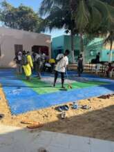 Competitors prepare the mats for competition