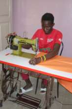 A Maison de la Gare sewing apprentice