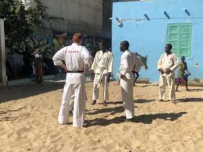 founder Robbie Hughes helps to prepare