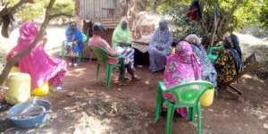 Community members during in a monthly meeting