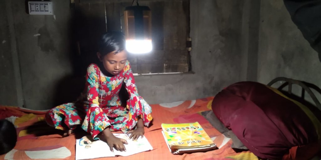 Students are continuing education using solar lamp