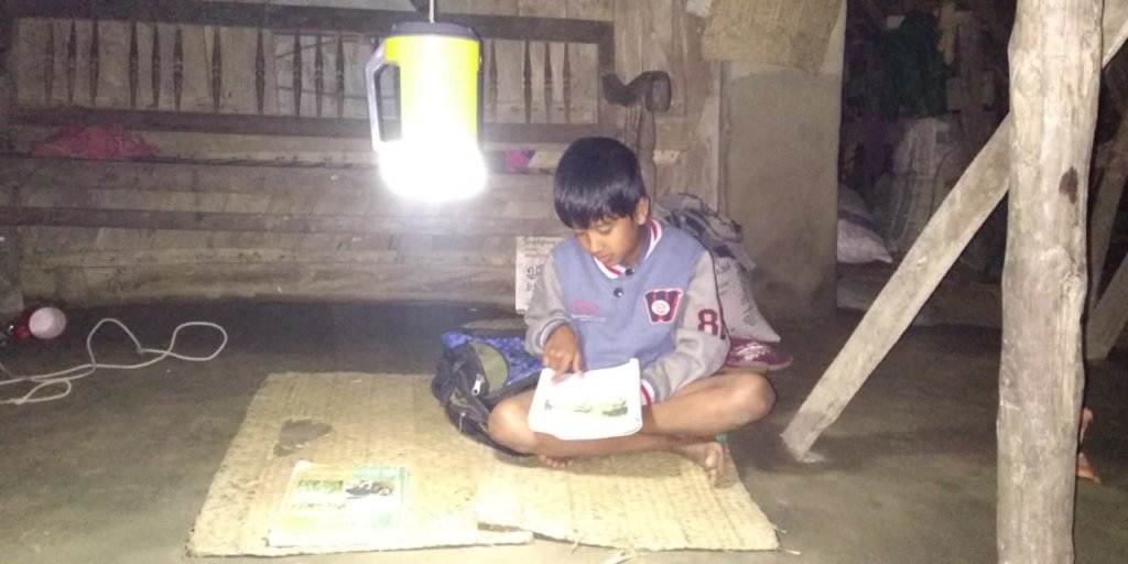 Students are continuing education using solar lamp