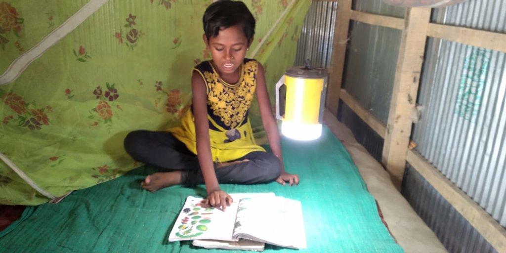 Students are continuing education using solar lamp