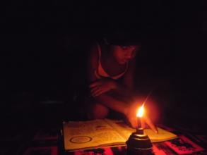 Poor students are studying with the help of lamp