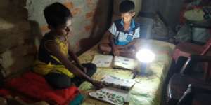 Students are continuing education using solar lamp