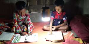 Students are continuing education using solar lamp