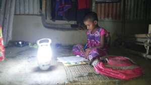 student reading during electricity cut off