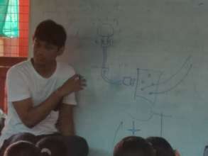The Story Of's Zubin explaining how circuits work