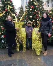 Lena, her son, and Vika enjoy the holidays