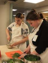 Inessa, chopping dill for soup