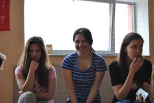 Katya (left) and two friends in theatre class