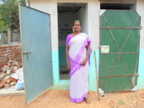 Saratha outside her Toilet
