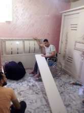 Ahmed furnishing a bedroom