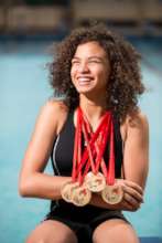 Malak wears her medal