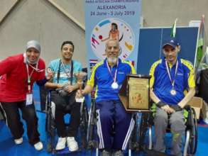 Walid with his Coach and Friends