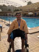 Abanob wearing his medal