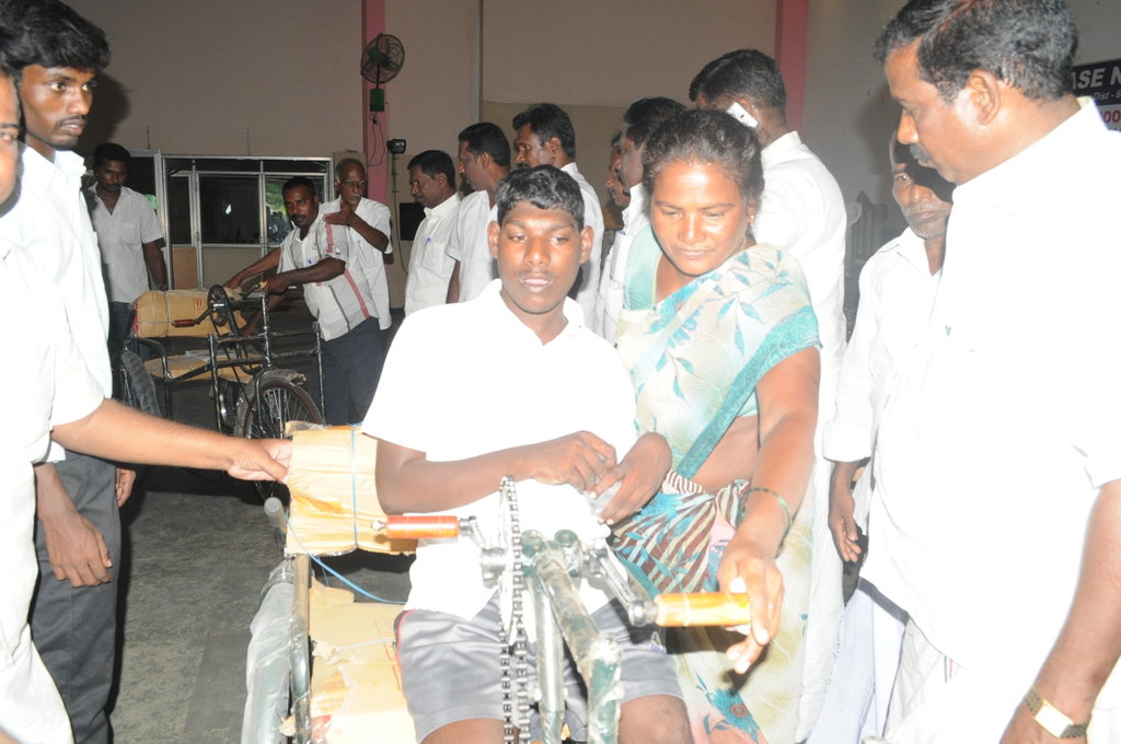 Tricycles to 3 disabled children