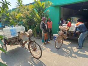 Carrying water for villagers