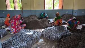 women preparing soil for the nursery