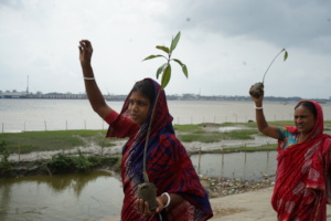 woman giving Slogan for mangrove restoration