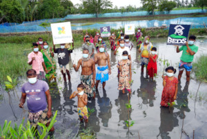 Happy villagers after mangrove plantation