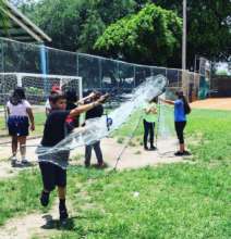 A student practicing his casting net throw