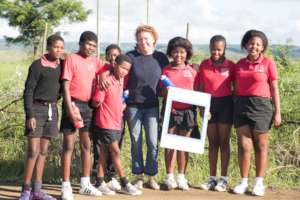 School founder Lou  with Grade 6 students