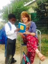 Barbara M and her young learner at Siyafunda