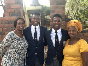 Okuhle and Awonke with their proud mothers.