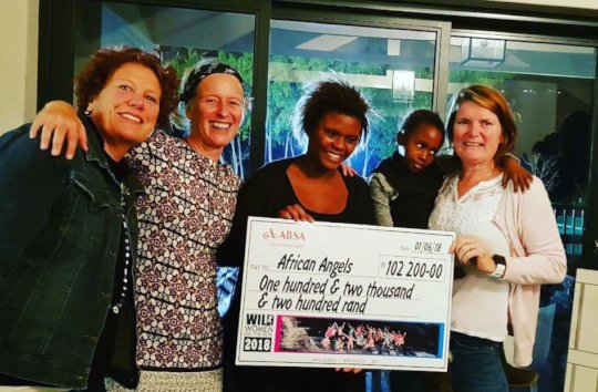 Wild Women On the Run hand over their 2018 cheque