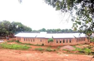 Roof going on to the Kimbilio Primary School