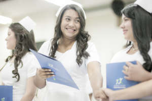 Student with their diploma