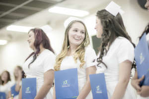 Students with their diplomas