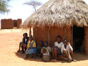 Children in front of their home