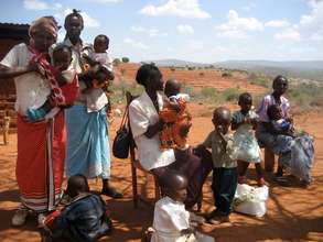 Mothers with children attending outreach clinic