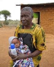 Grandmother caring for Nndunge's baby