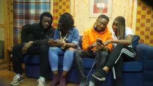 Lesline and artists at a working session