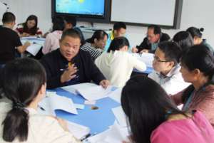 Module 1.  Group 4 discussing lessons learned