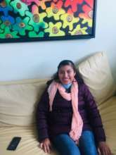 Jacqueline happy in the living room