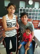 Joshua and his parents